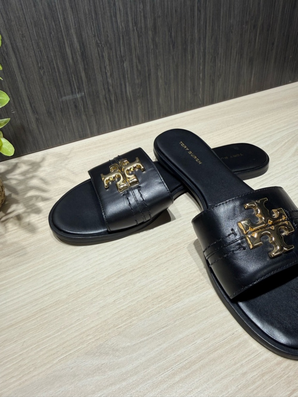 Tory Burch Black Leather Slides with Gold Logo Accent